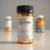 Close-up of a prescription bottle with clear label showing medication names, dosage, and tablets, on a clean surface with soft lighting.