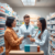 A modern pharmacy interior with a pharmacist consulting a patient, surrounded by medicine shelves and prescription bottles.