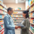 Bright pharmacy interior with colorful medicine shelves, a pharmacist assisting a patient, and healthcare symbols like a stethoscope and prescripti...