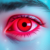 Close-up of a red, watery human eye surrounded by illustrations of pollen, dust mites, and pet dander, representing allergic conjunctivitis and eye...